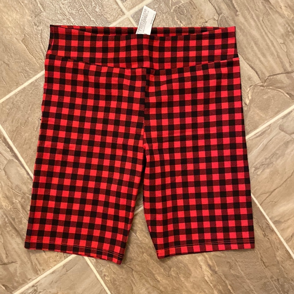 Red checkered shorts.
